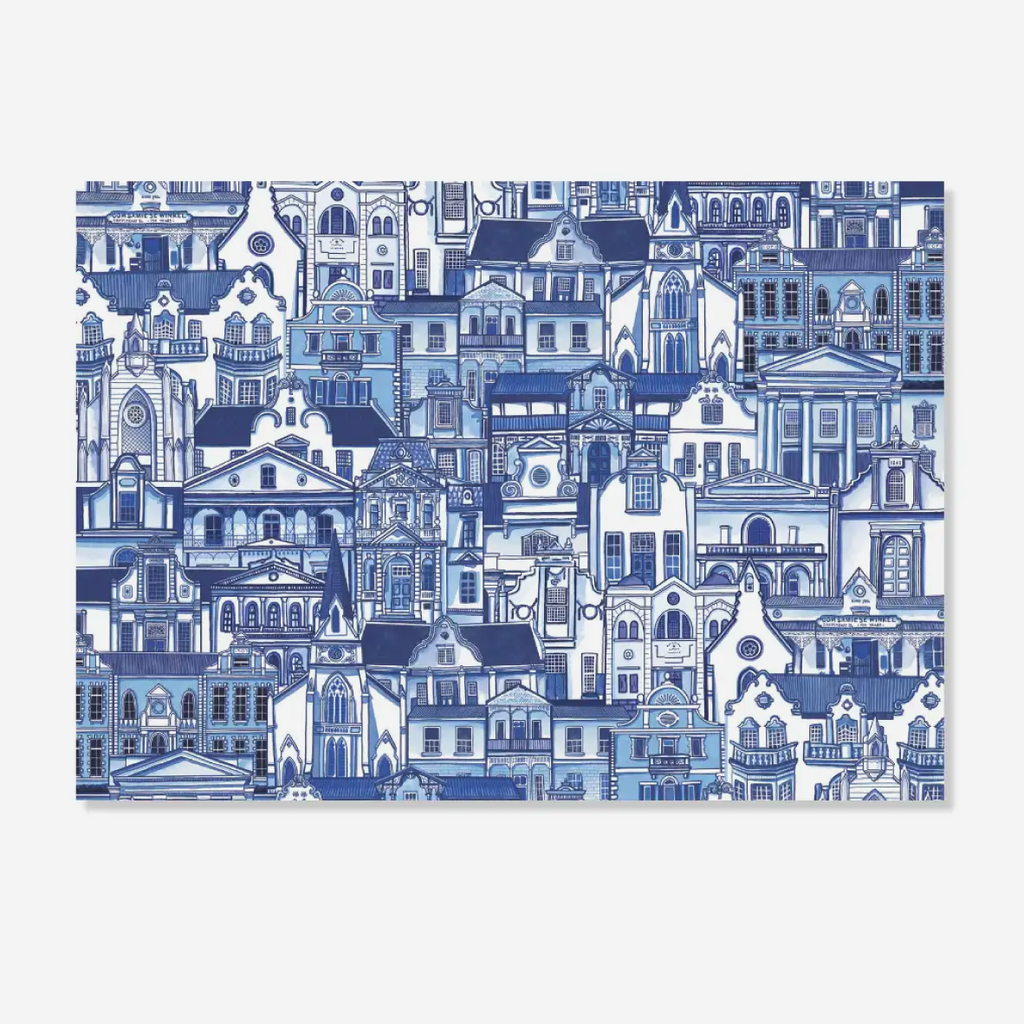 Paper placemats featuring an intricate blue and white architectural illustration of dense historic buildings, shown against a light gray background.