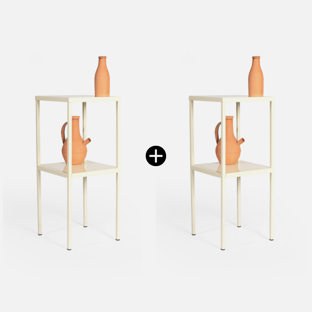 Two white tables with terracotta vases on a light grey background